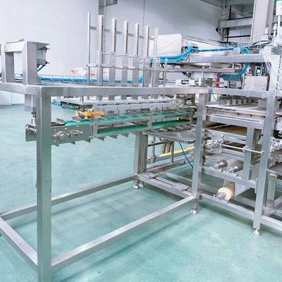 Automatische machine voor het snijden en omhullen van bonenkoekjes voor de tofuproductie, capaciteit 1500 B/h